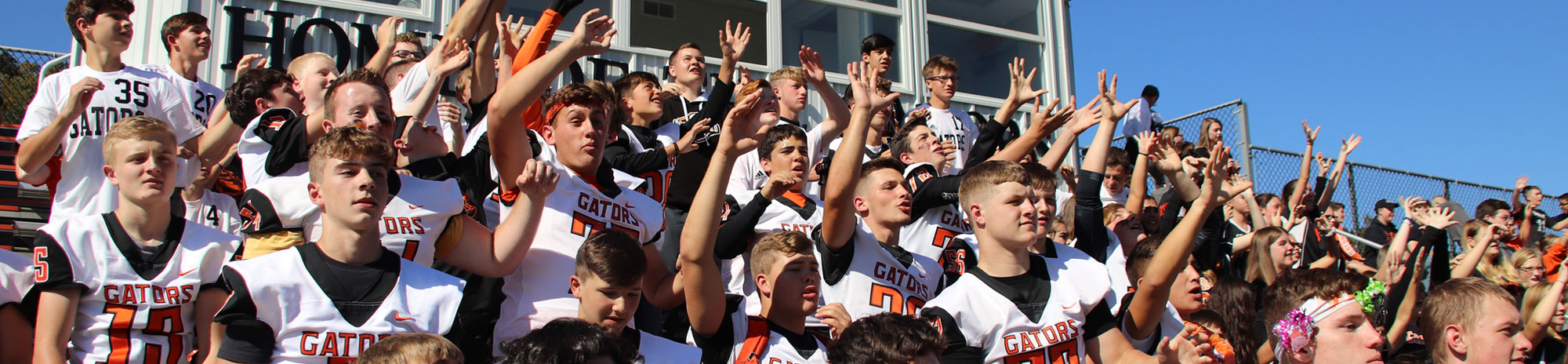 Port Allegany football players cheering in the stands