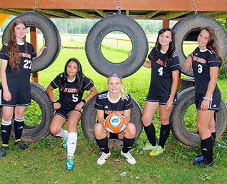 five volleyball players